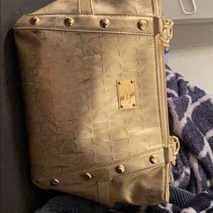 Michael kors gold bag.